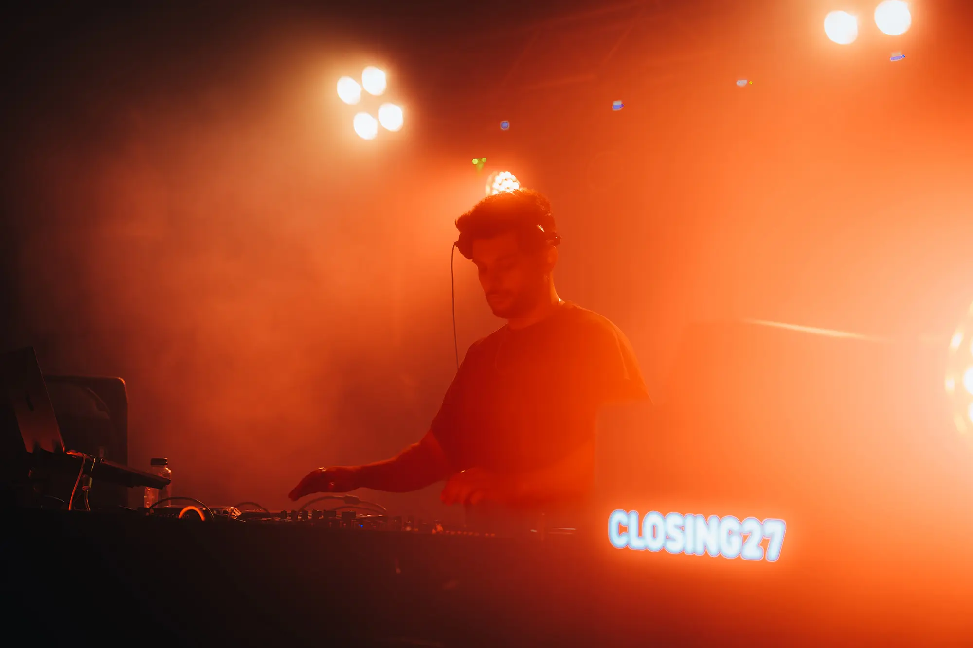Cloud9 DJing in orange haze at Closing27, The Place Mamaia