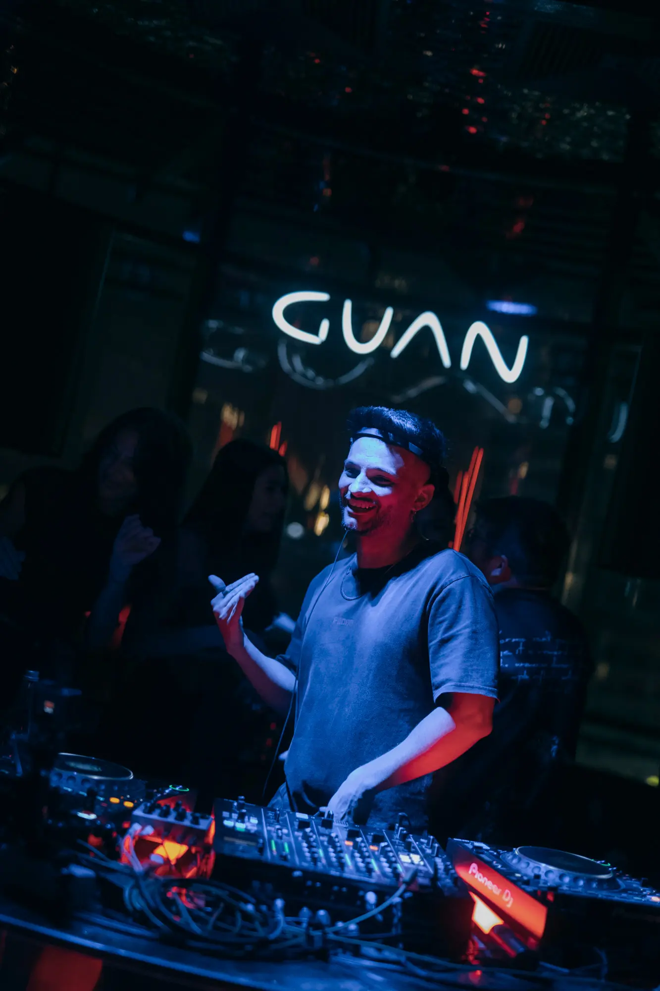 Cloud9 smiling behind the decks at GUAN club in Bucharest